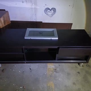 Modern black TV stand with storage