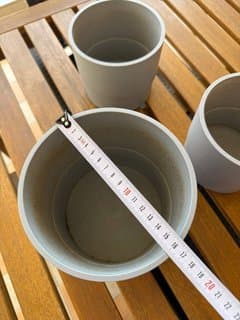 Three plastic planters