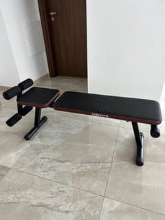 Sports bench and adjustable dumbbells